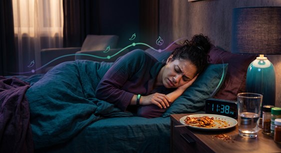 Adult in bed with food nearby and decorative heat lines